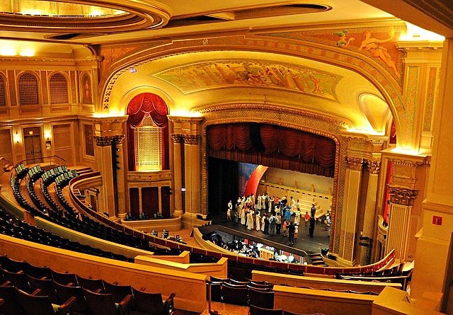Interior of Hawaii Theatre Center showing the grand auditorium with ornate architecture and stage lighting